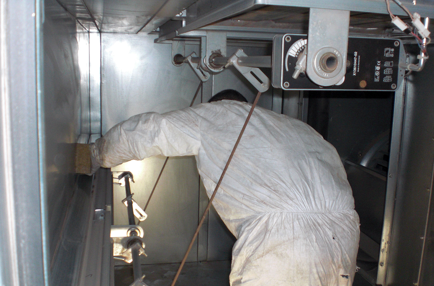 Commercial ductwork cleaning in progress by TERS Environmental Restoration experts
